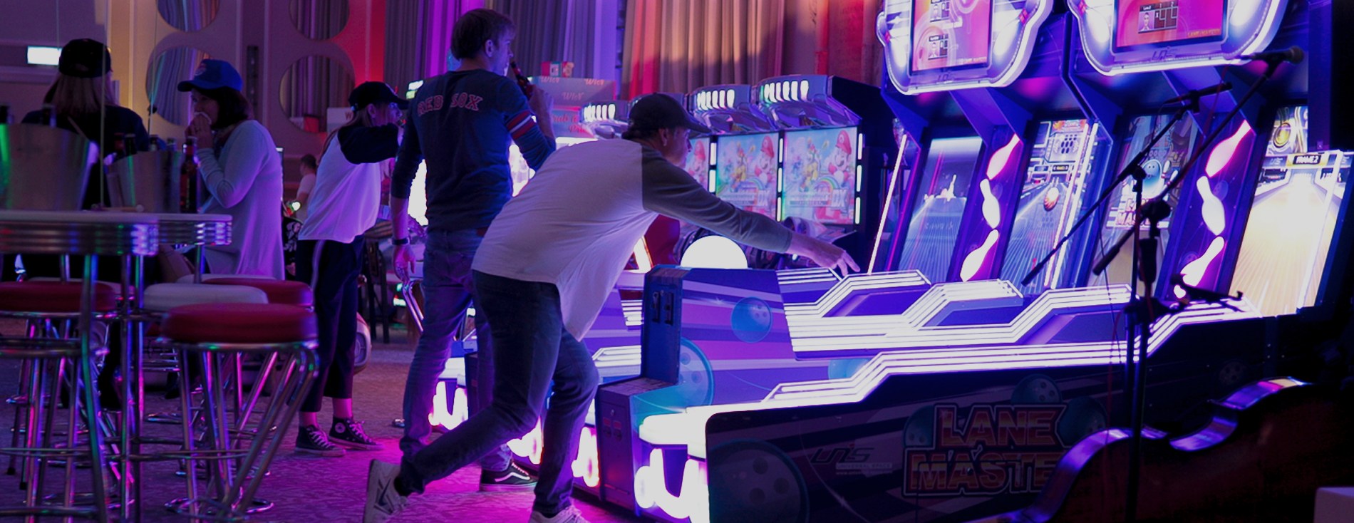 Lane Master Bowling Arcade game being played at a party