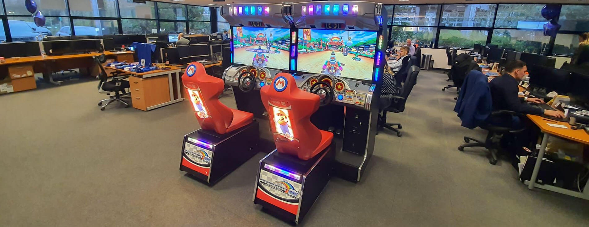 Mario Kart DX arcade machine hired for an office space