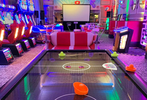 Air hockey and multiple arcade games set up a full arcade installation for hire