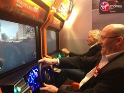 Richard Branson playing our Grid Racing Deluxe arcade game