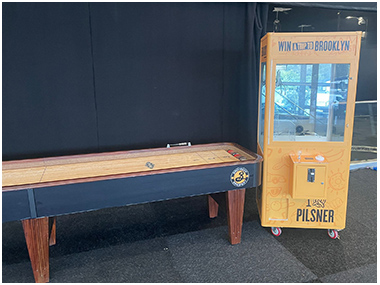 Brooklyn Larger Branded Shuffleboard and Prize Grabber Crane available for hire