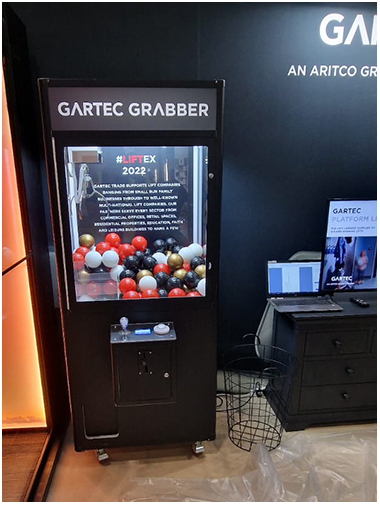 Gartec Branded Arcade Claw Machine available for trade show event hire