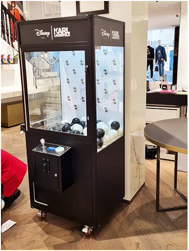 Karl Largerfeld Branded Prize Claw Machine arcade game available for product activation
