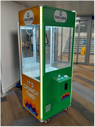Taylors Snacks Branded Claw Machine available for hire