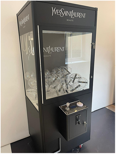 YSL Branded Prize Grabber Claw Machine available for event hire
