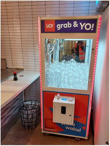 Yo sushi branded claw machine available for hire