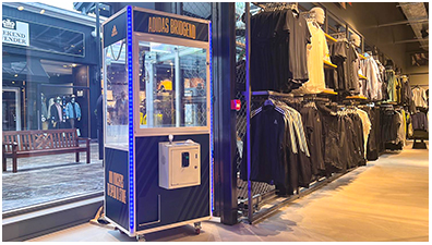 Adidas Branded Prize Grabber Claw machine available for event hire